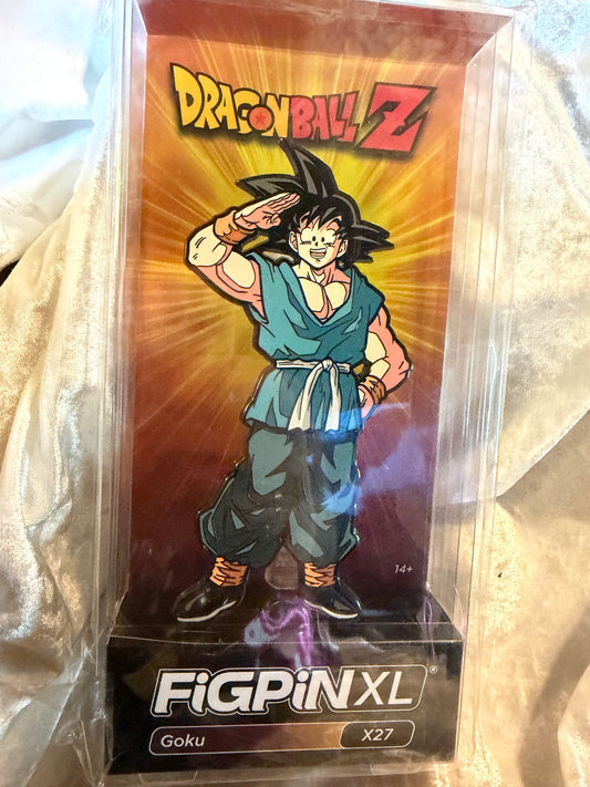 Casual Saluting Goku FiGPiN XL #X27 Dragon Ball Z 6-inch premium enamel pin in soft plastic display box with character art card