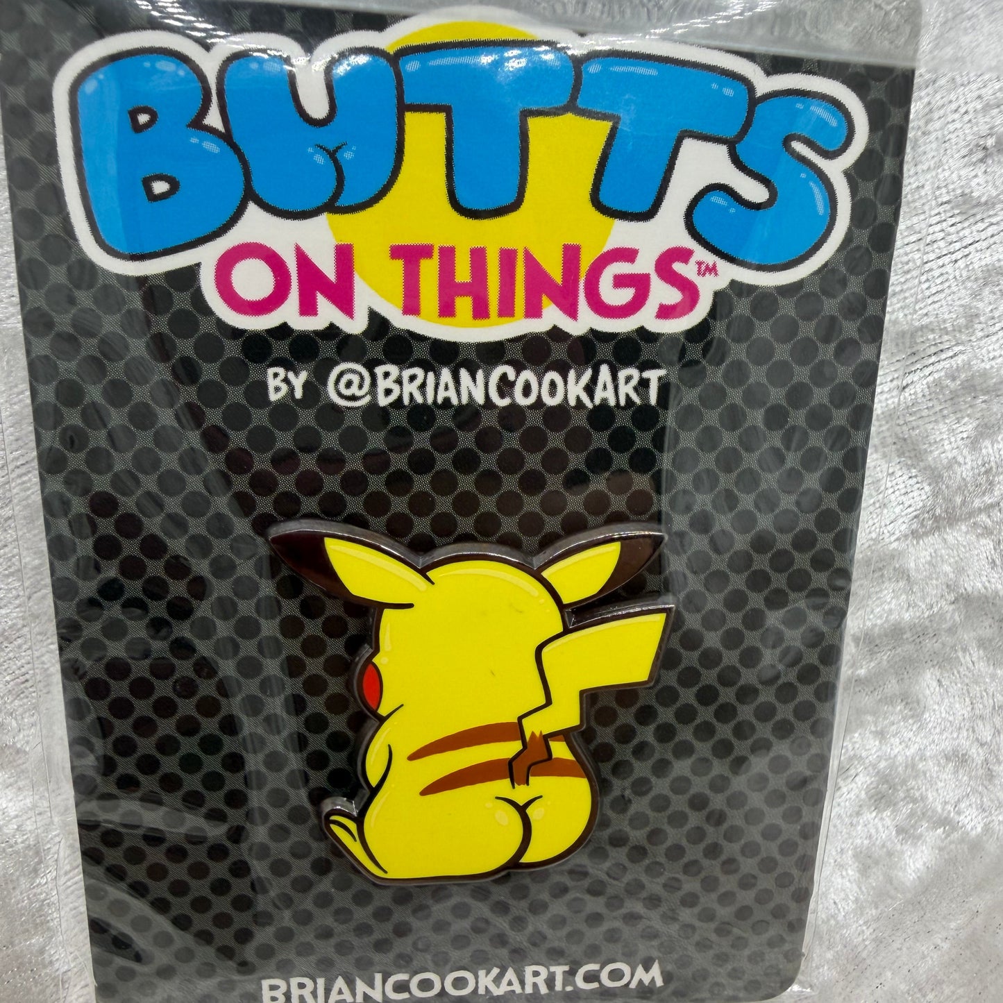 Electric Rat Butt Pin by Brian Cook funny yellow pocket monster parody enamel pin on backing card