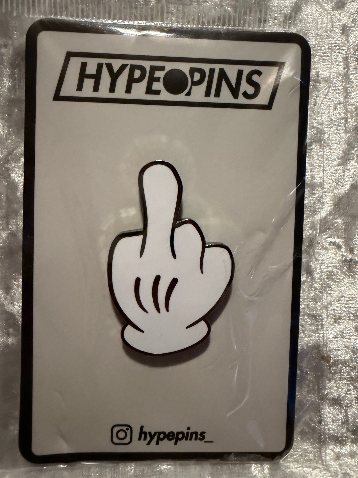 The **Mickey "the Bird" Hard Enamel Pin**, an edgy and expressive **pop culture art collectible** by Hype Pins, perfect for adding a statement to any collection.