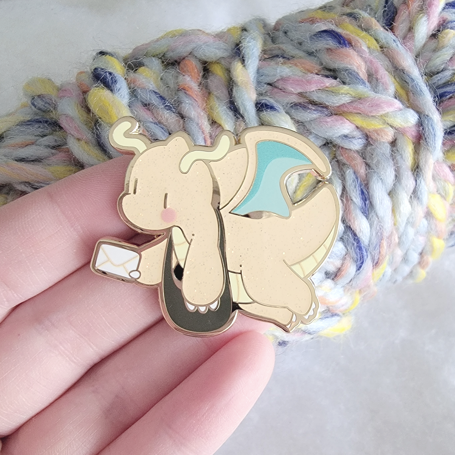 Delivery Dragonite Enamel Pin | Gold Metal, Glitter & UV Print | Xhilyn - Fan Made