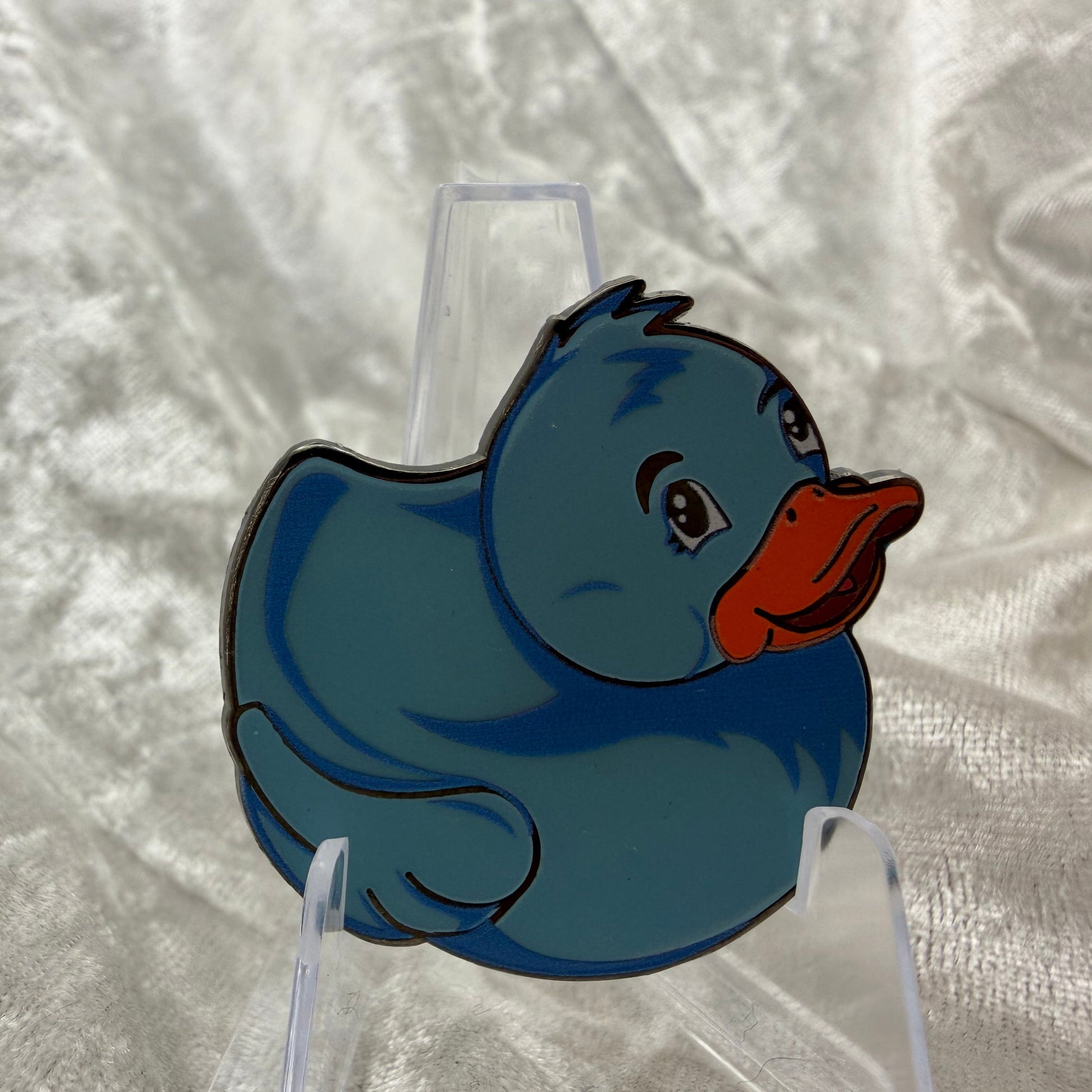 1.5 inch blue glow in the dark duck enamel pin by Bendiesticks, limited edition of 30.