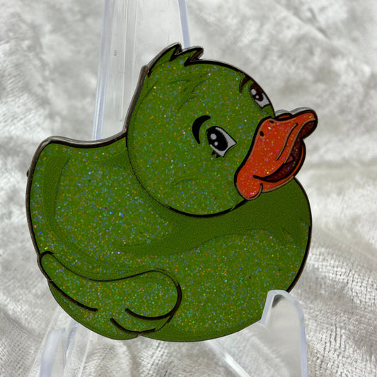 1.5 inch green glitter duck enamel pin designed by Bendiesticks, ultra limited edition of 10.