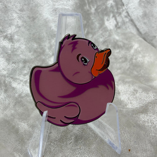 1.5 inch pink glow in the dark duck enamel pin by Bendiesticks, limited edition of 30.
