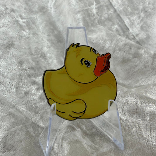 1.5 inch yellow glow in the dark duck enamel pin by Bendiesticks, limited edition of 30.