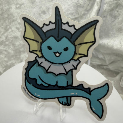  A 3-inch water elemental fox vinyl sticker with a solid white border on a laptop cover.