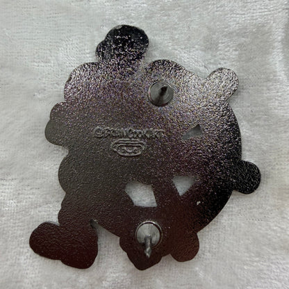 Back of Brian Cook Steambutt Willie parody enamel pin
