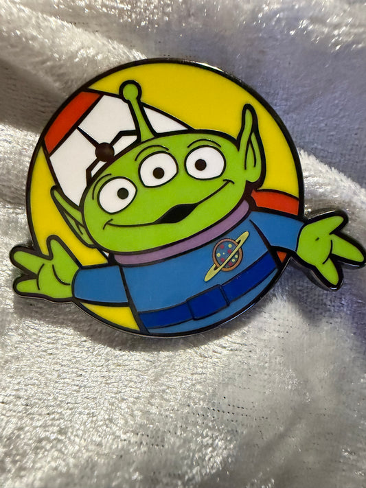 Close-up of Alien FiGPiN Mini #Y1056 from Toy Story, officially licensed enamel pin
