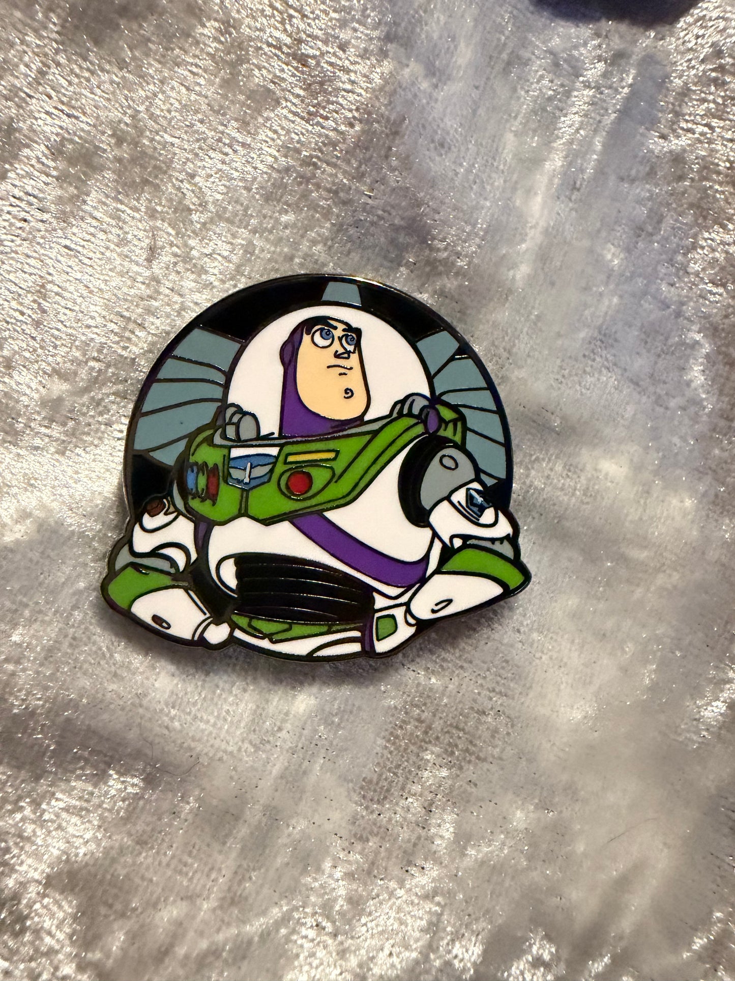 Close-up of Buzz Lightyear FiGPiN Mini #Y1054 from Toy Story, officially licensed enamel pin