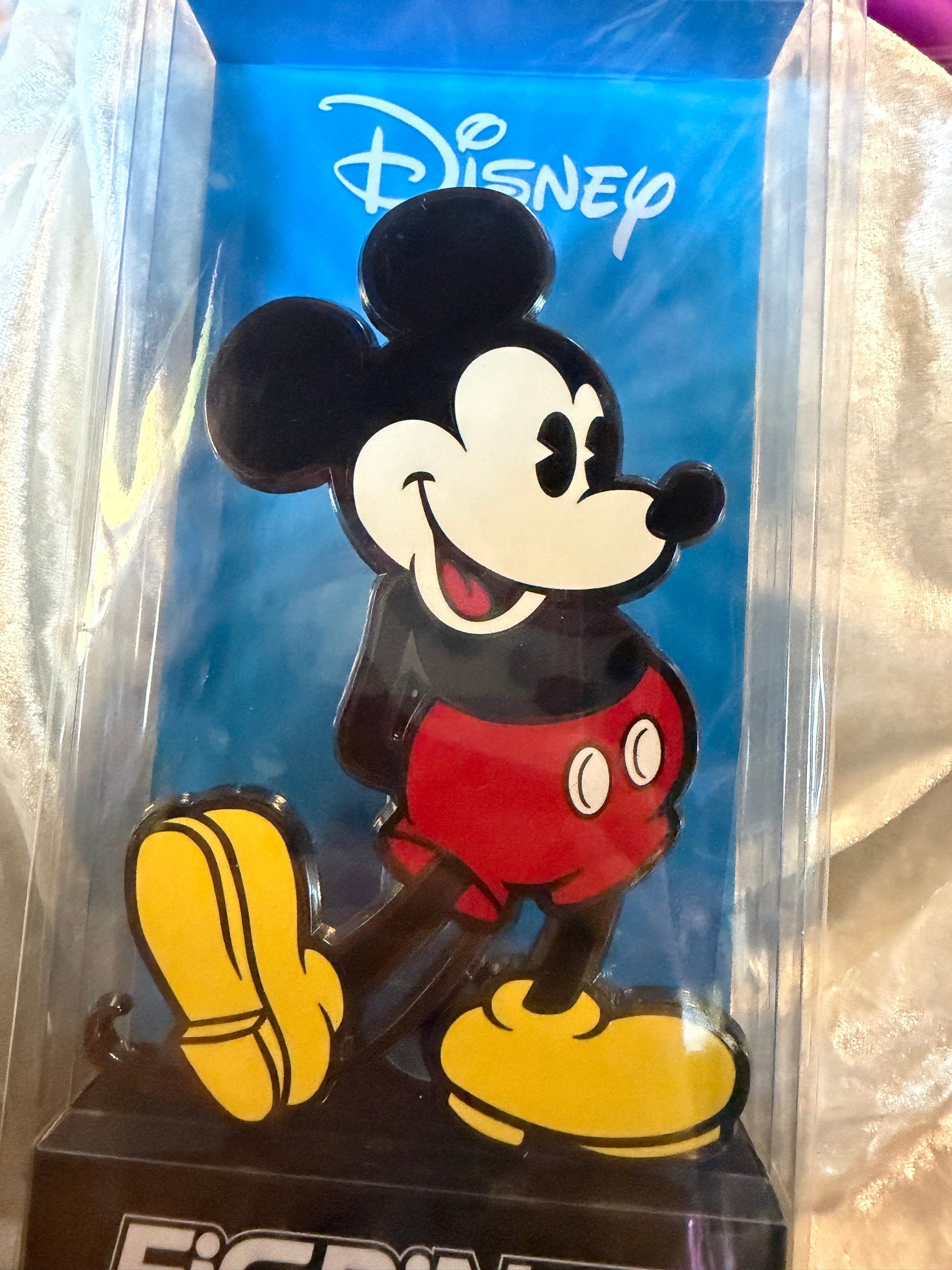 Close-up of Classic Disney Mickey Mouse FiGPiN XL #X32 in soft plastic display box, officially licensed collectible