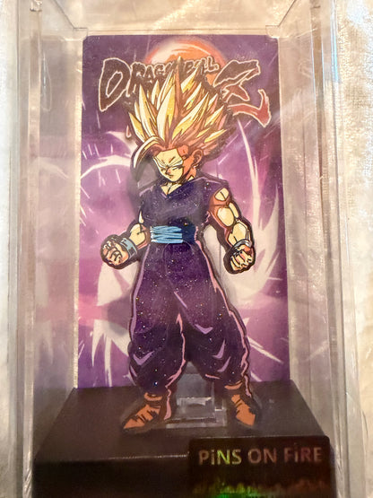 Close-up of Dragon Ball Z Gohan FiGPiN #385, officially licensed Pins On Fire Exclusive glitter enamel pin