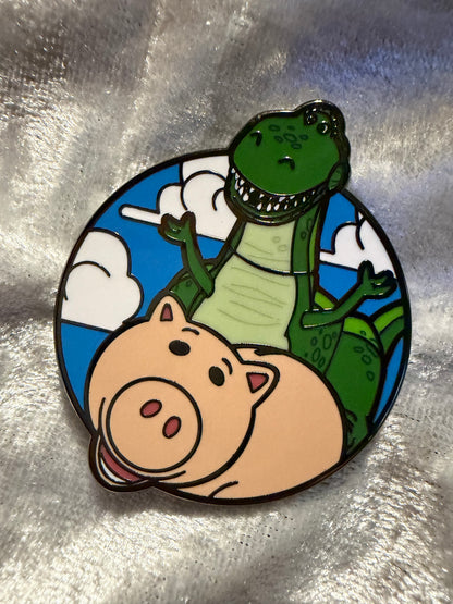 Close-up of Hamm and Rex FiGPiN Mini #Y1058 from Toy Story, officially licensed enamel pin