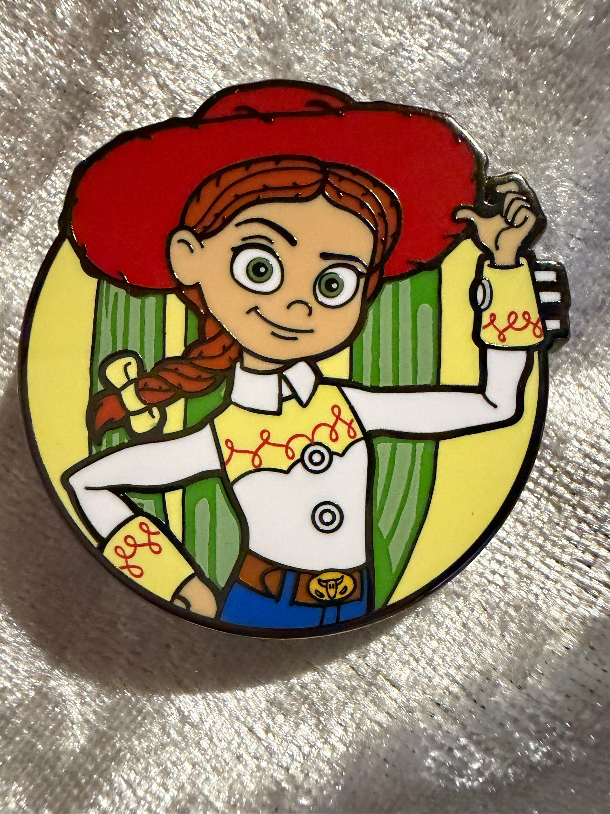Close-up of Jessie FiGPiN Mini #Y1055 from Toy Story, officially licensed enamel pin