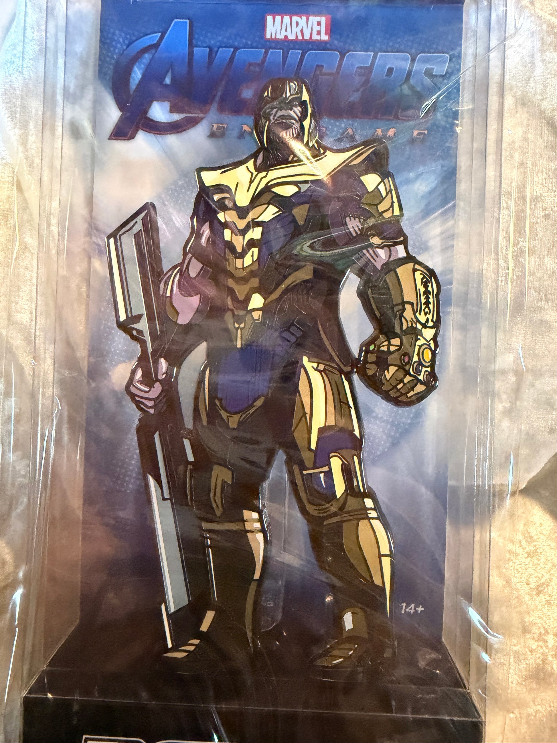Close-up of Marvel Avengers Endgame Thanos FiGPiN XL #X9 in soft plastic display box, officially licensed collectible