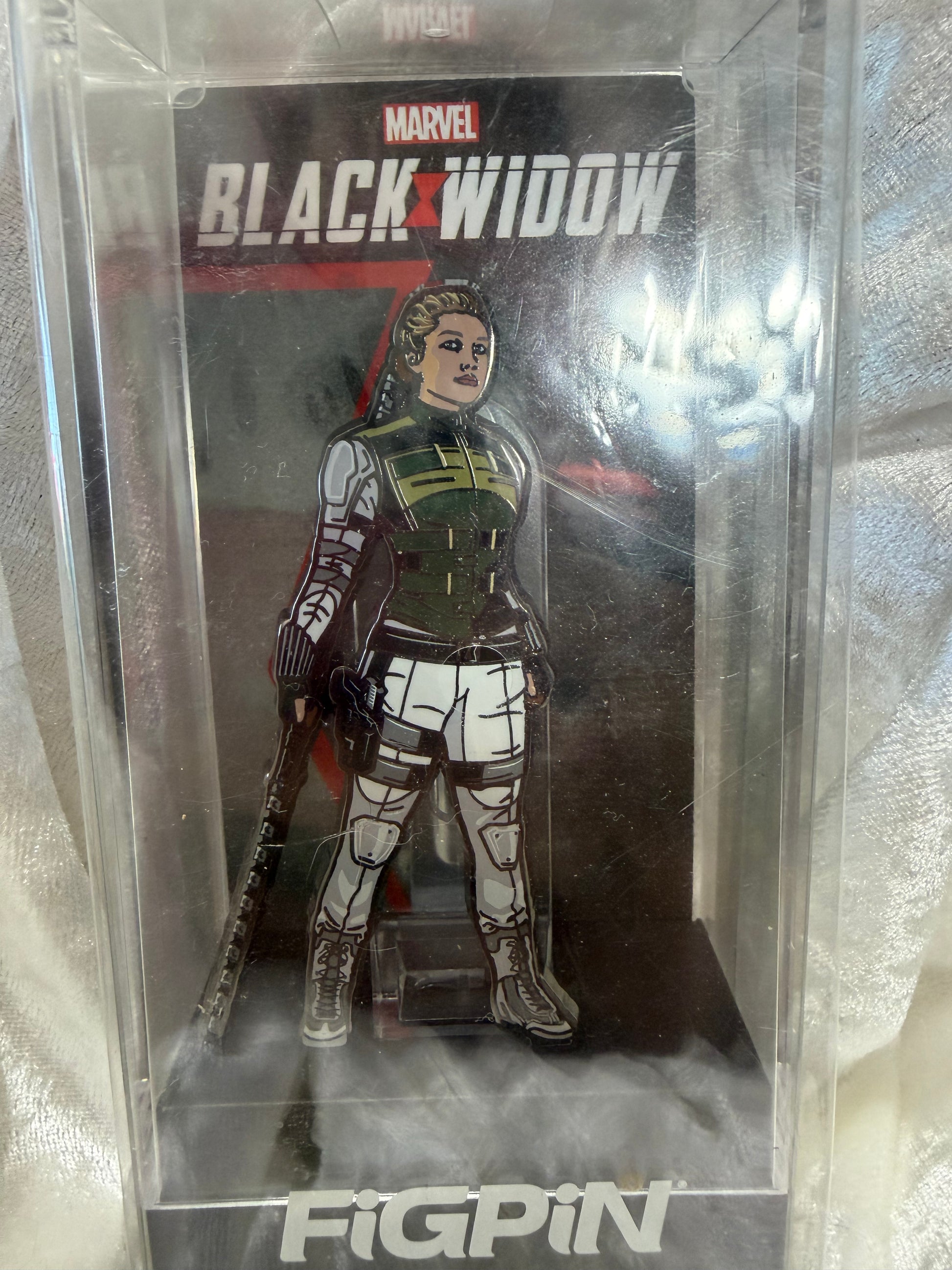 Close-up of Marvel Black Widow Yelena Belova FiGPiN #400, officially licensed FiGPiN Exclusive enamel pin