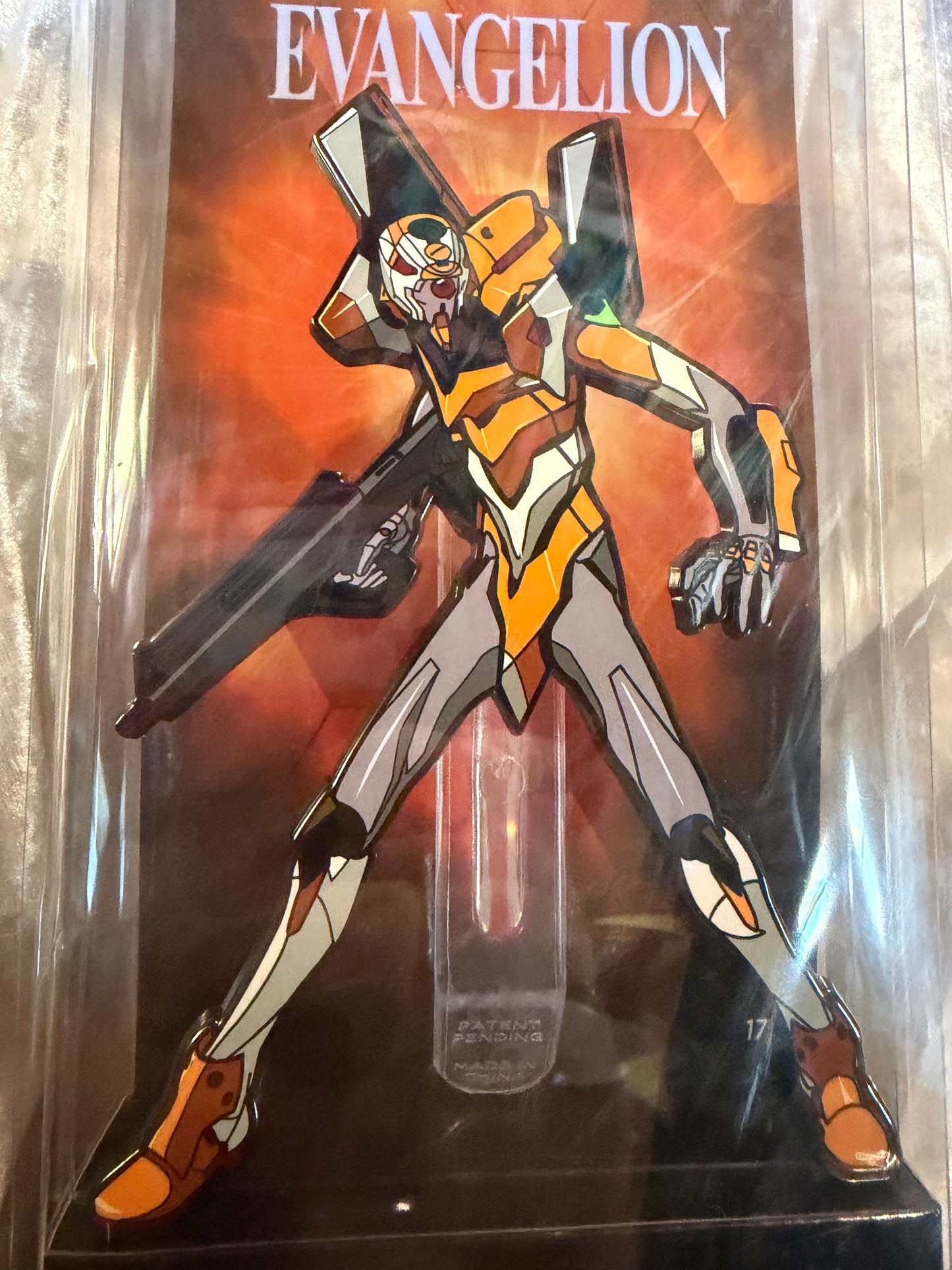 Close-up of Neon Genesis Evangelion EVA Unit 00 FiGPiN XL #X46 in soft plastic display box, officially licensed collectible