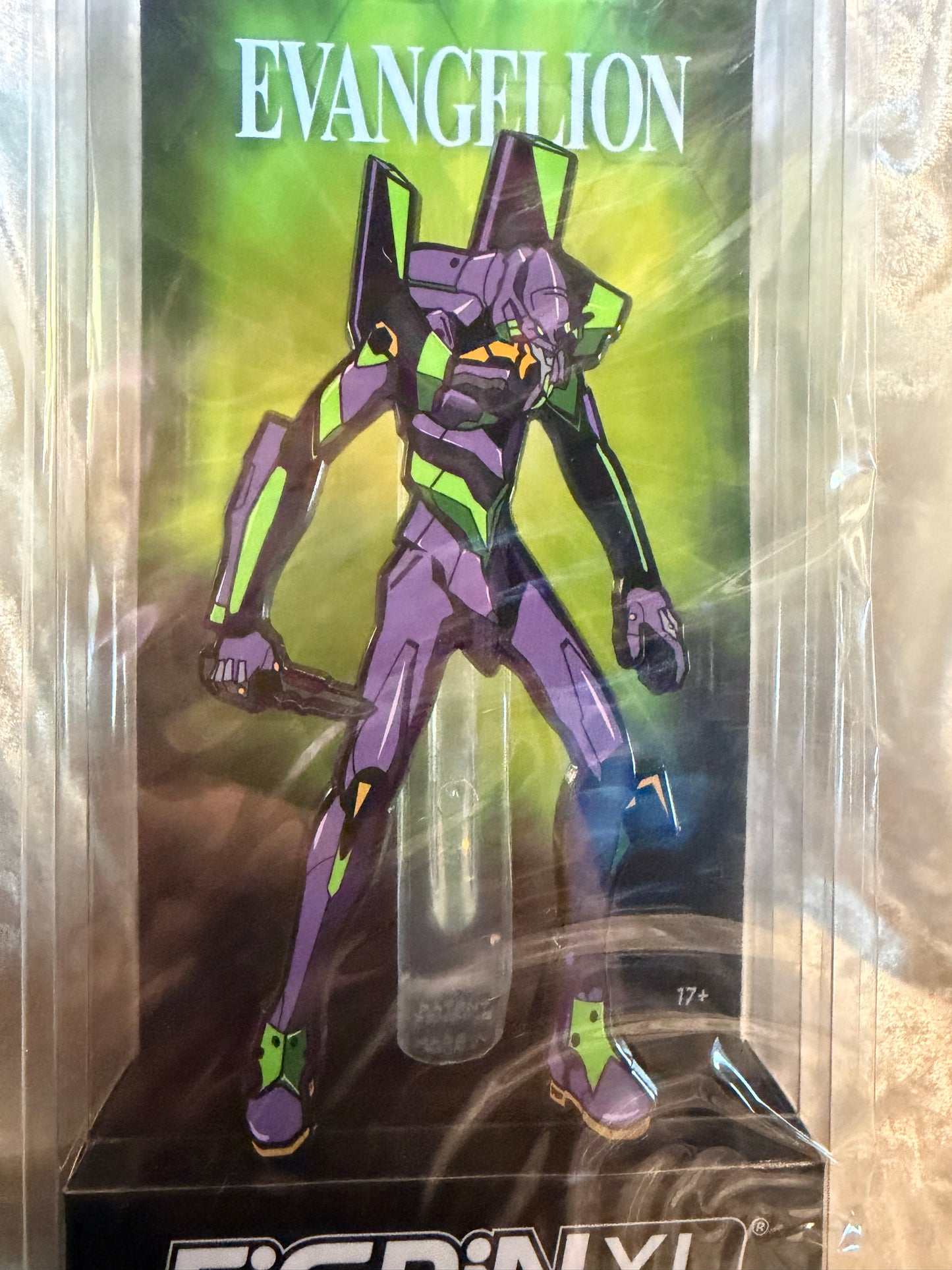 Close-up of Neon Genesis Evangelion EVA Unit 01 FiGPiN XL #X35 in soft plastic display box, officially licensed collectible