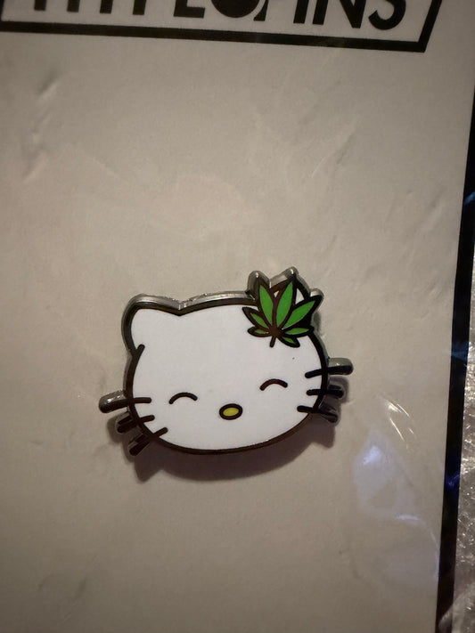 Close-up of the **Hello Litty Hard Enamel Pin**, showing vibrant colors, sleek hard enamel finish, and black nickel metal detail. A unique art collectible by Hype Pins.