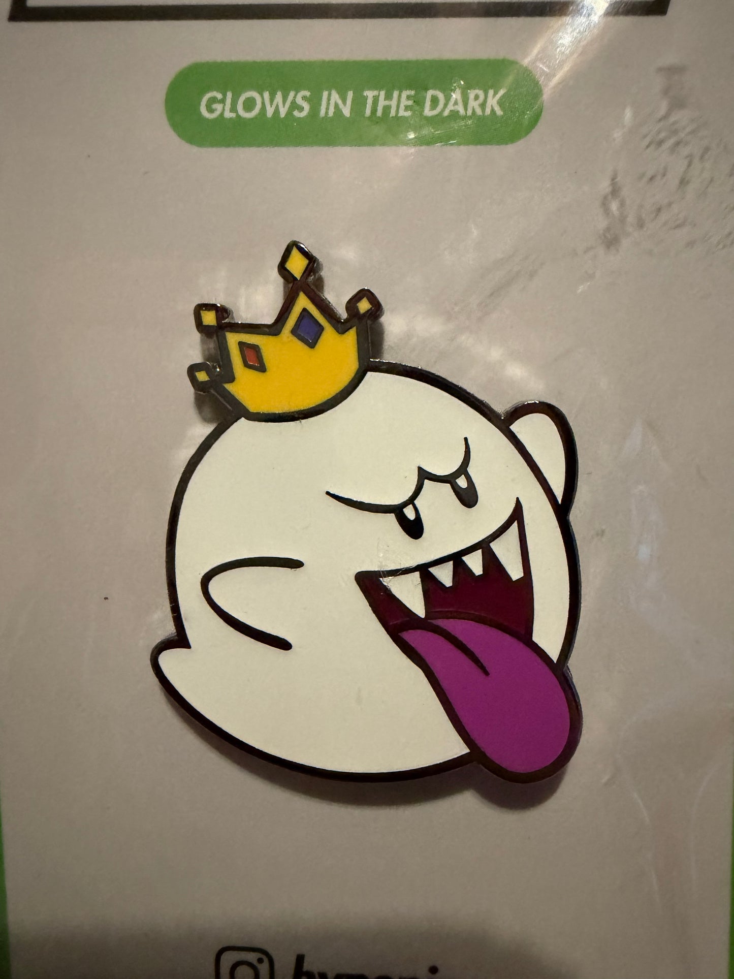 Close-up of the **King Boo Glow In The Dark Hard Enamel Pin**, highlighting its intricate details, hard enamel finish, and **glowing effect**. A premium Super Mario collectible.
