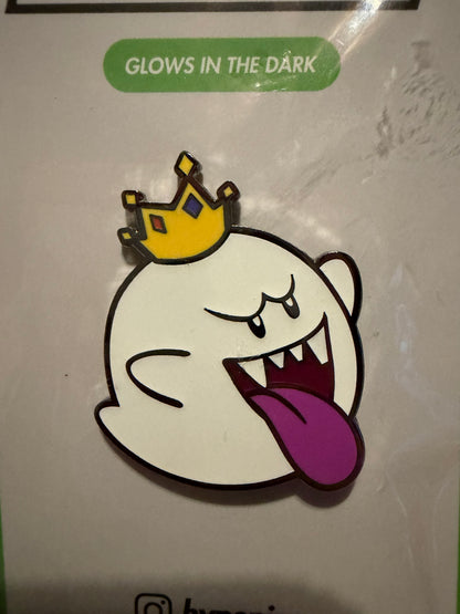 Close-up of the **King Boo Glow In The Dark Hard Enamel Pin**, highlighting its intricate details, hard enamel finish, and **glowing effect**. A premium Super Mario collectible.