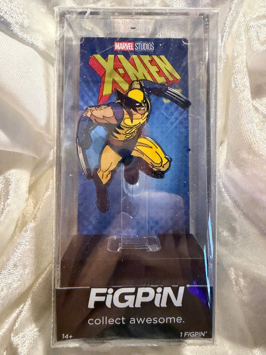Damaged X-Men Animated Series Wolverine FiGPiN #2133, showing cracked plastic display case and detailed enamel pin.