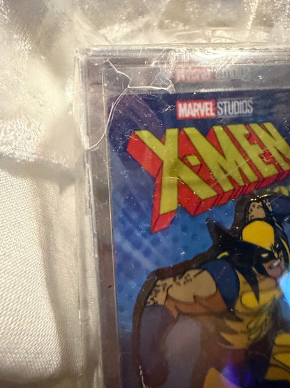 Damaged X-Men Animated Series Wolverine FiGPiN #2133, showing cracked plastic display case and detailed enamel pin.