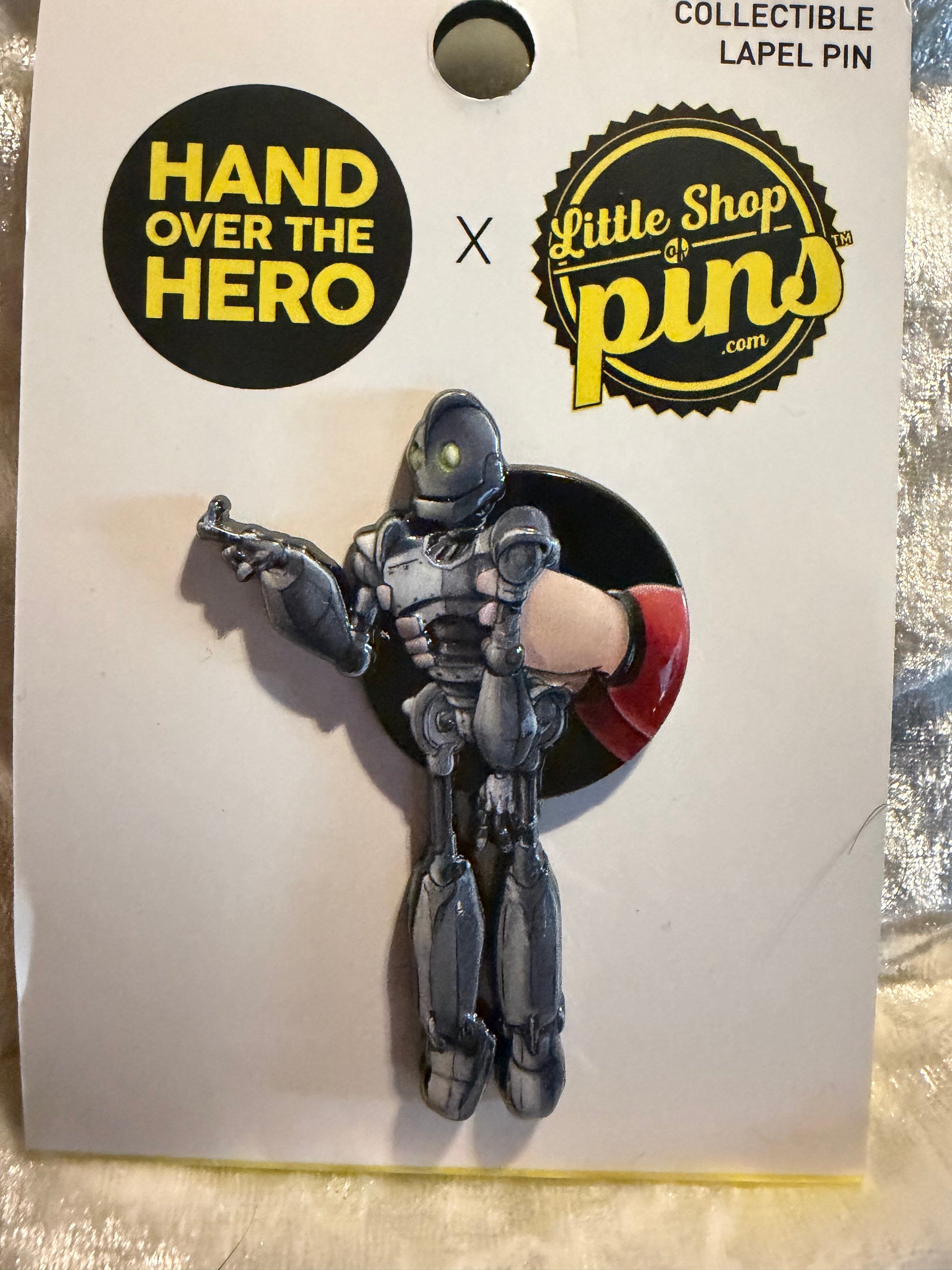 Detail shot of the Iron Giant collaboration pin by Little Shop Of Pins and Hand Over the Hero.