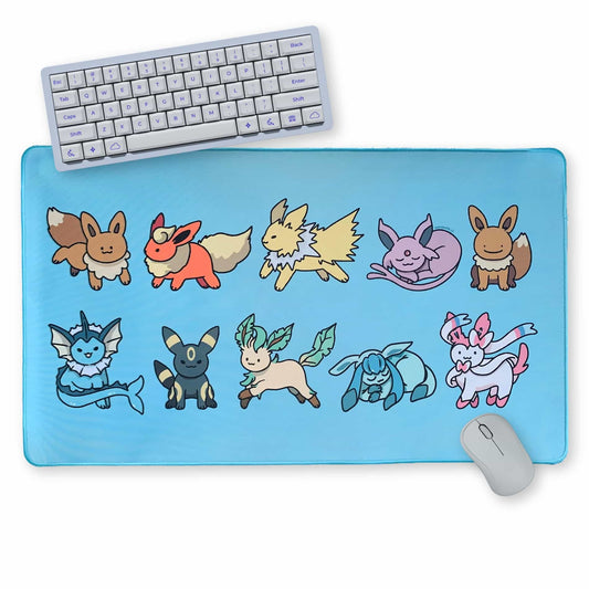 Elemental Fox desk mat with vibrant hand-drawn fantasy fox artwork on a cozy gaming desk setup.