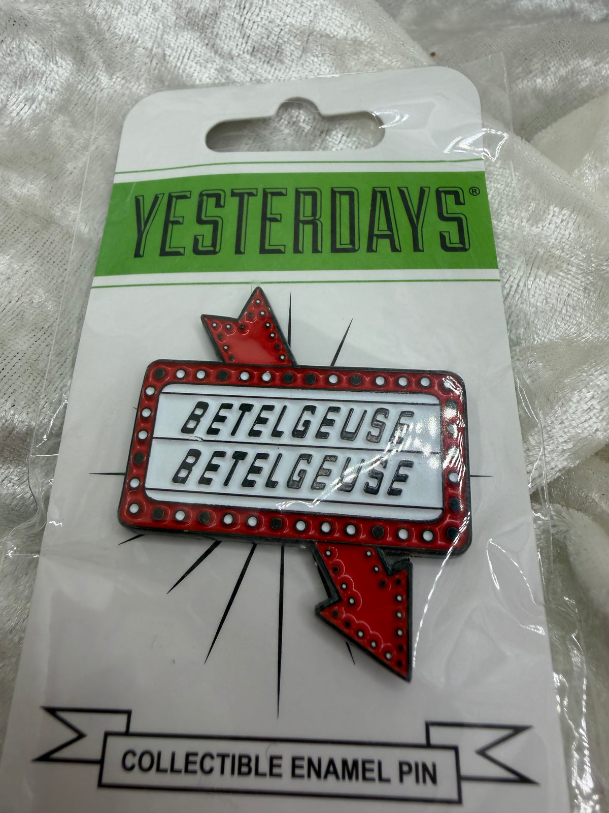 Fan made by Yesterdays Pins 1.50 inch soft enamel white plated glow in the dark lapel pin Graveyard Sign featuring Beetlejuice black rubber backer