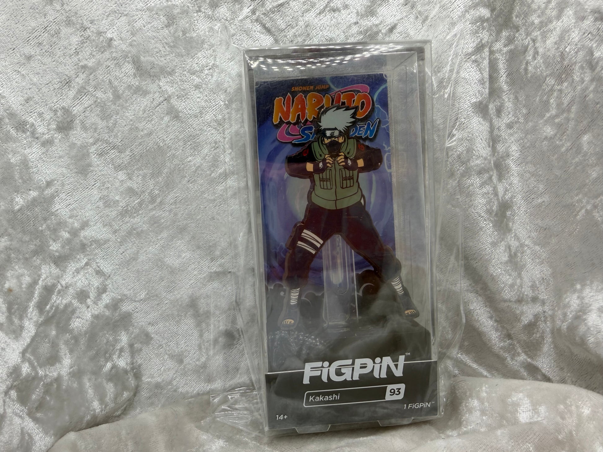 FiGPiN Naruto Kakashi Hatake pin number 93 in clear hard display case showing light wear.