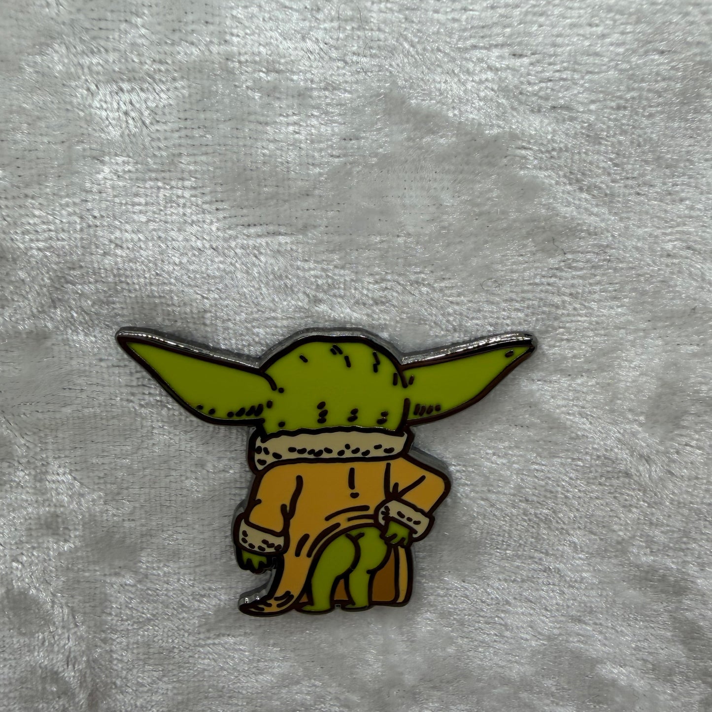 Funny baby green alien butt parody enamel pin by artist Brian Cook from Hatcher's Collectibles
