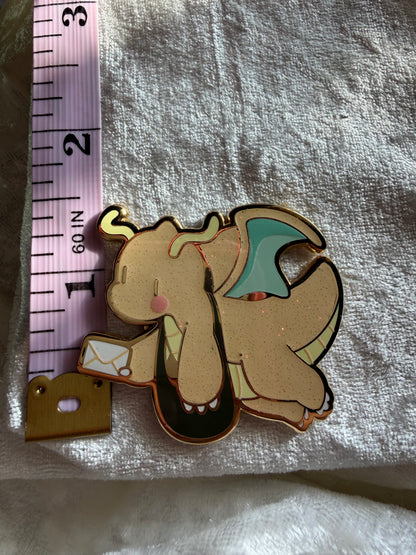 Delivery Dragonite Enamel Pin | Gold Metal, Glitter & UV Print | Xhilyn - Fan Made