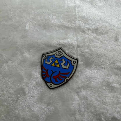 Elf Shield Butt Pin by Brian Cook | Funny Gaming Parody Enamel Pin