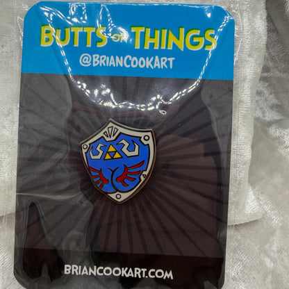 Elf Shield Butt Pin by Brian Cook | Funny Gaming Parody Enamel Pin