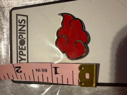 Nimbus Cloud Black & Red Hard Enamel Pin by Hype Pins, displayed next to a tape measure to show its **1.5-inch size**. This Dragon Ball Z collectible features a distinctive black nickel metal finish.