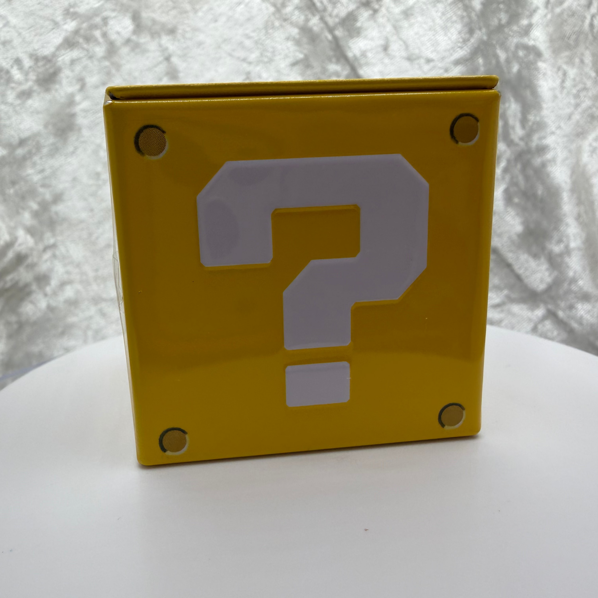 Nintendo Question Mark Box tin filled with strawberry coin-shaped sour candies