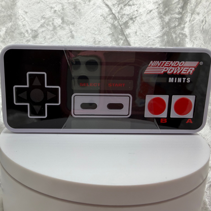 Retro Nintendo NES controller metal mint tin with peppermint candies
