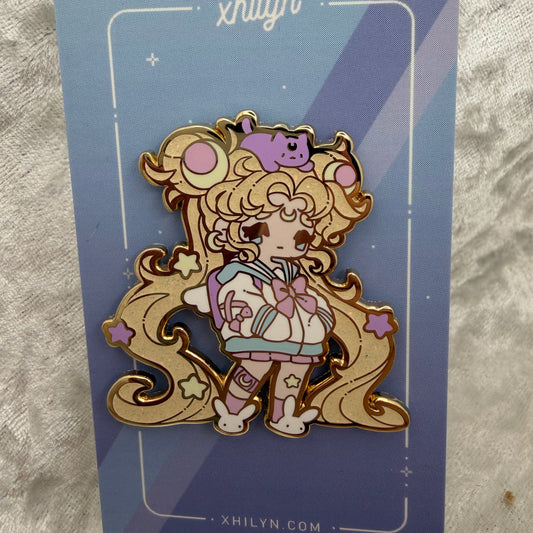 Sailor Moon inspired "Moon Brat" hard enamel pin pinned to a collector backing card.