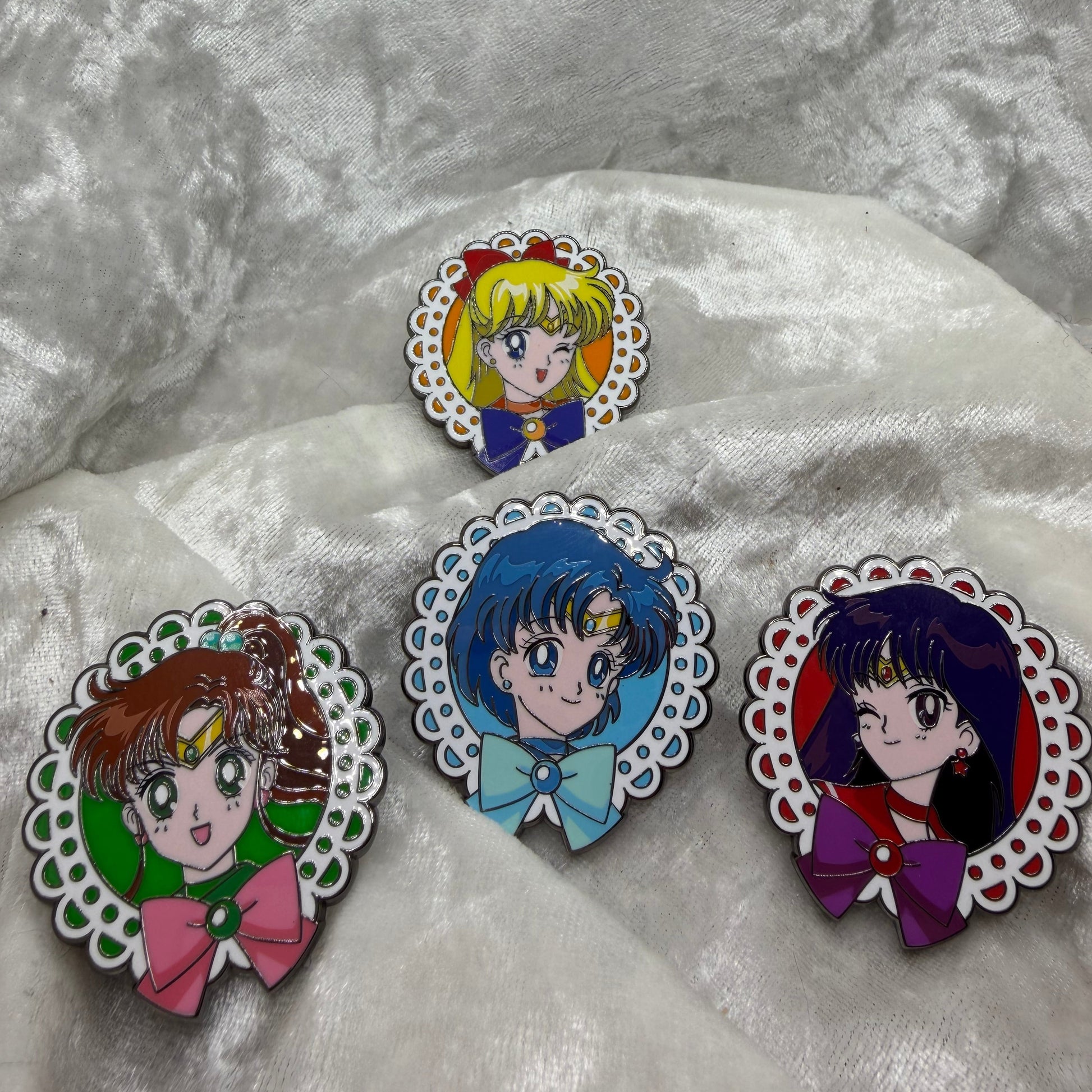 Set of four common FiGPiN Mystery Mini Sailor Moon Series 2 pins featuring Venus Mars Jupiter and Mercury