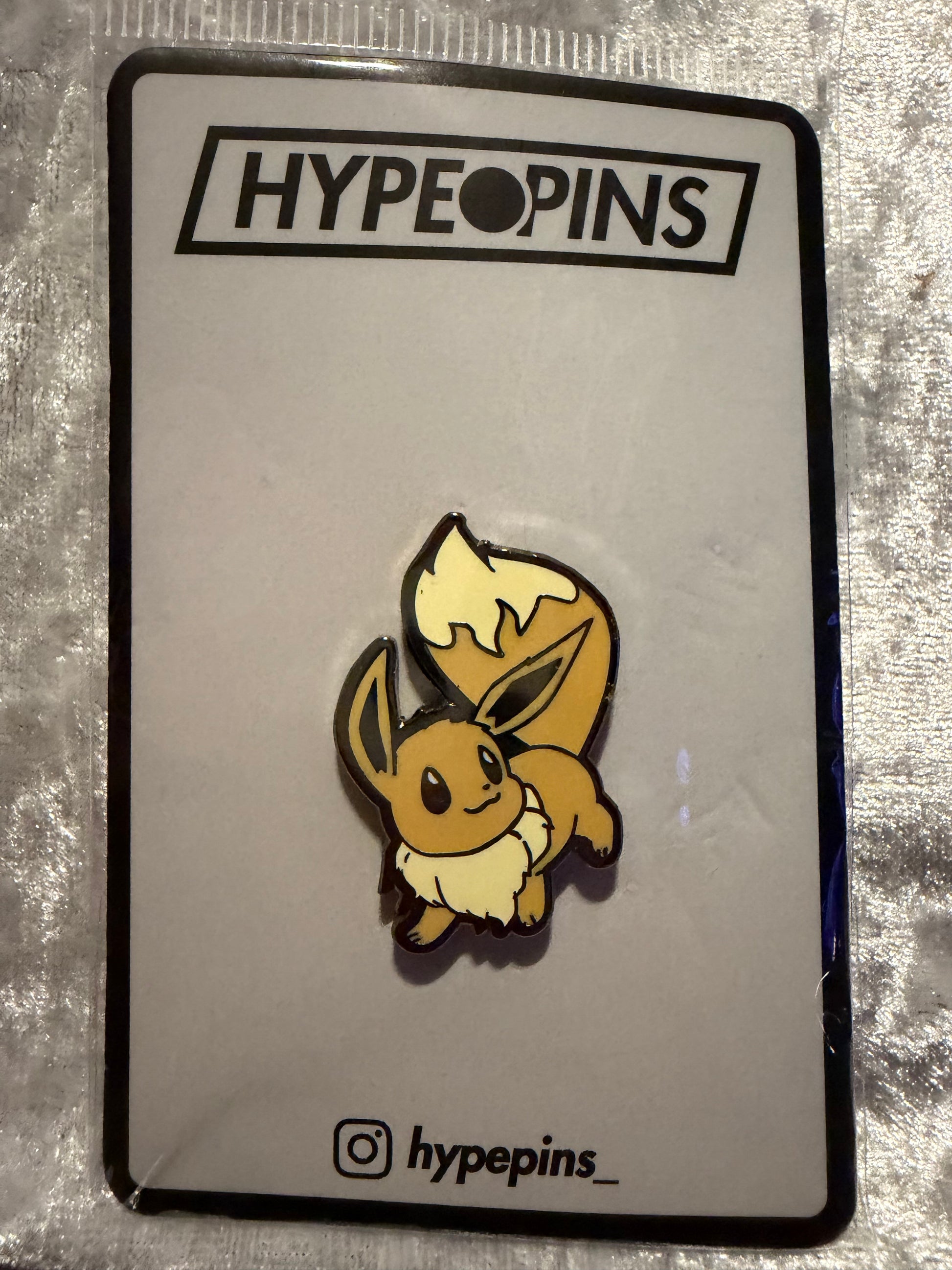 The **Pokémon Eevee Hard Enamel Pin**, a charming **Eevee collector's pin** by Hype Pins, perfect for any fan of the iconic Pokémon.