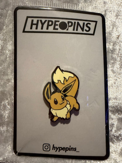 The **Pokémon Eevee Hard Enamel Pin**, a charming **Eevee collector's pin** by Hype Pins, perfect for any fan of the iconic Pokémon.