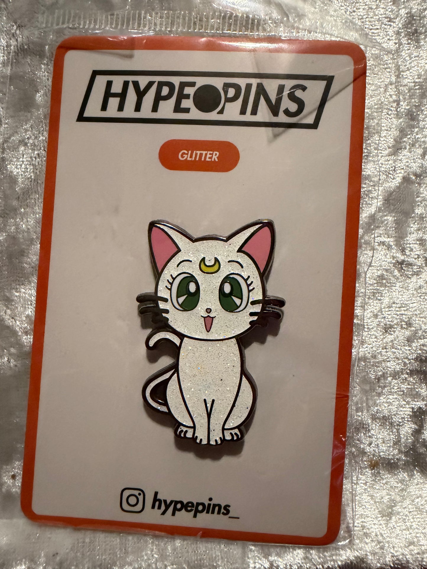 The **Sailor Moon Cat Artemis Hard Enamel Pin**, a vibrant **Sailor Moon collectible** by Hype Pins, featuring the wise guardian cat Artemis in a classic pose.
