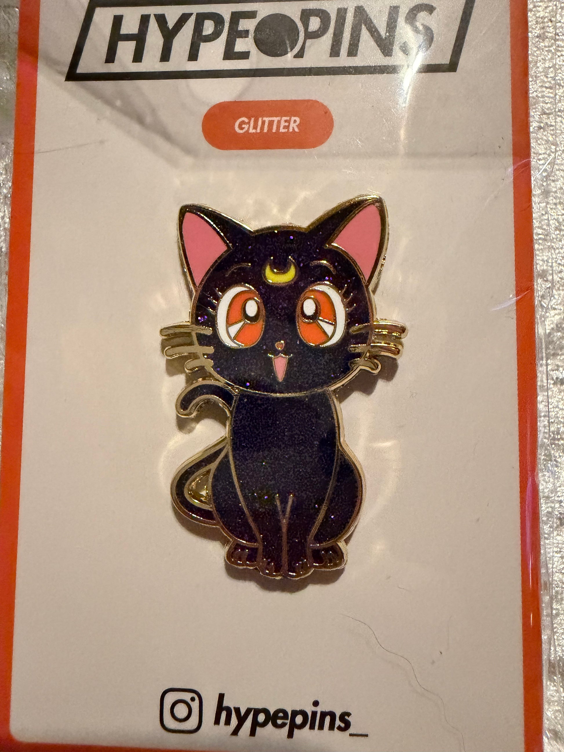 The **Sailor Moon Cat Luna Hard Enamel Pin**, a vibrant **gold-plated Sailor Moon collectible** by Hype Pins, featuring the wise guardian cat Luna in a classic pose.