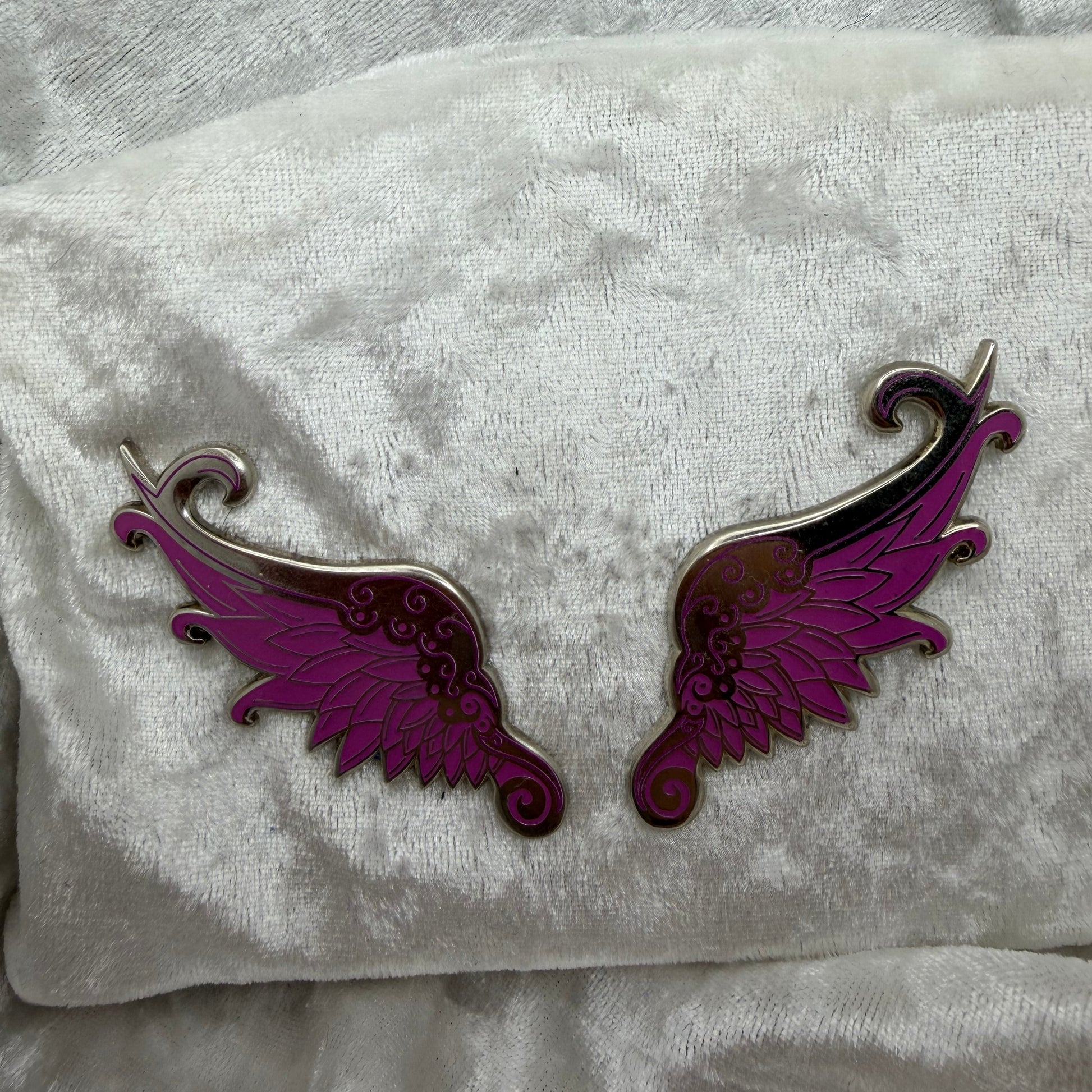  Wing set of two pins pink and silver by Bendiesticks limited edition fifteen two inch pins Hatcher’s Collectibles